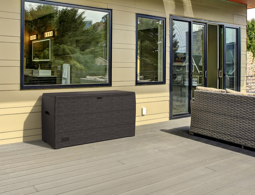 Plastic storage shed for patio, storage for summer equipment or outdoor decorations.