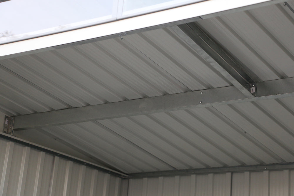 Anthracite metal shed for patio, strong metal roof to hold snow.