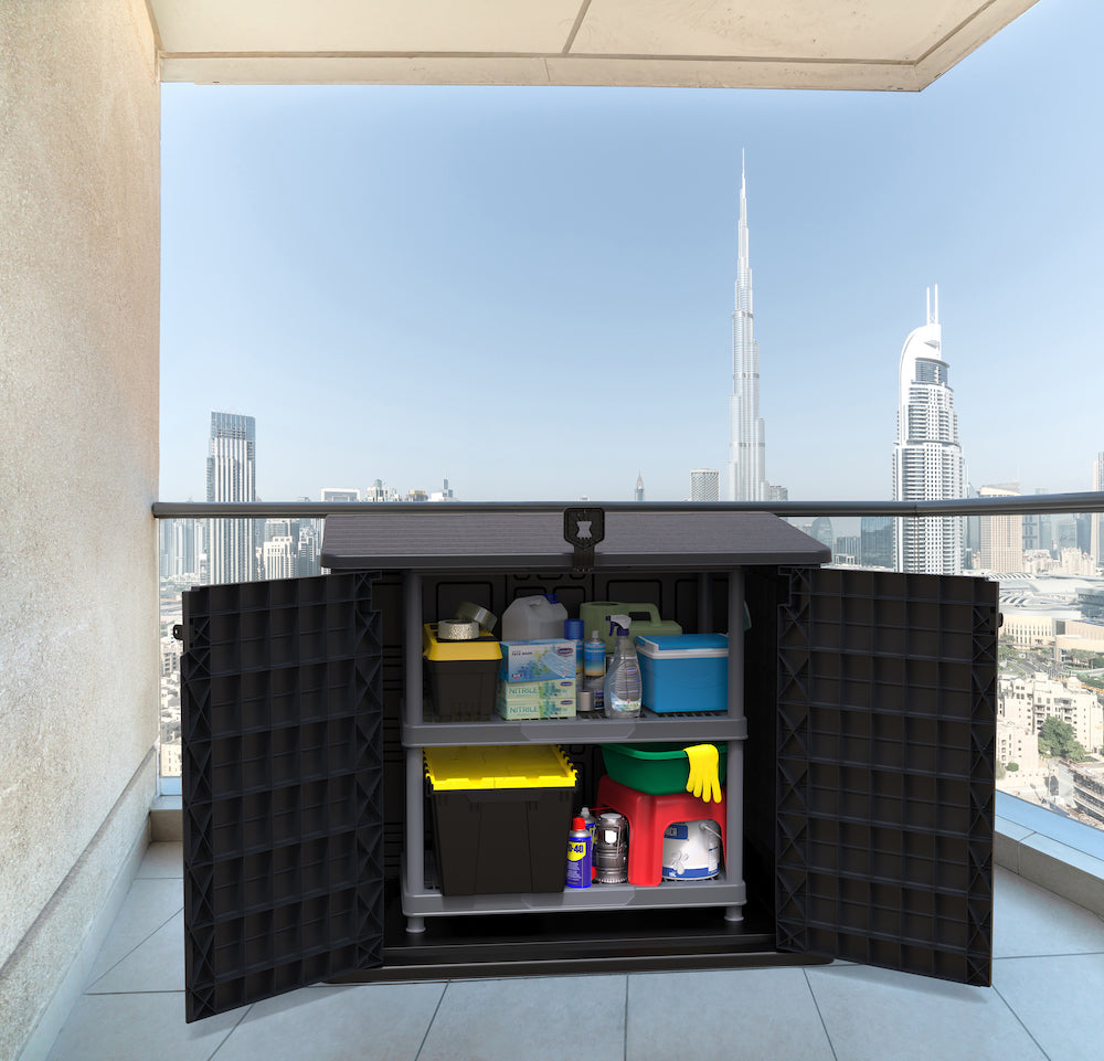 Plastic grey storage shed for patio with double door entry to store any outdoor tools.