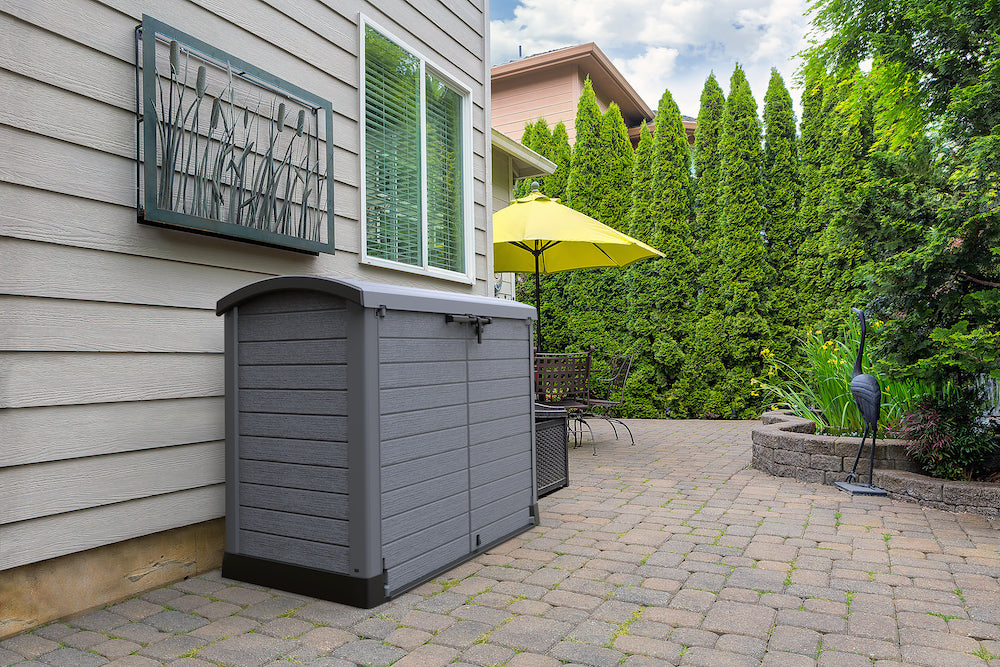 Grey plastic garden storage shed.