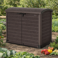 Duramax StoreAway 1200L Brown storage shed in a garden with vegetables and fruit