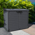 Duramax StoreAway 1200L Gray outdoor storage box with green plants in the background