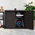 Duramax Outdoor storage cabinet with shelves and plants on a patio