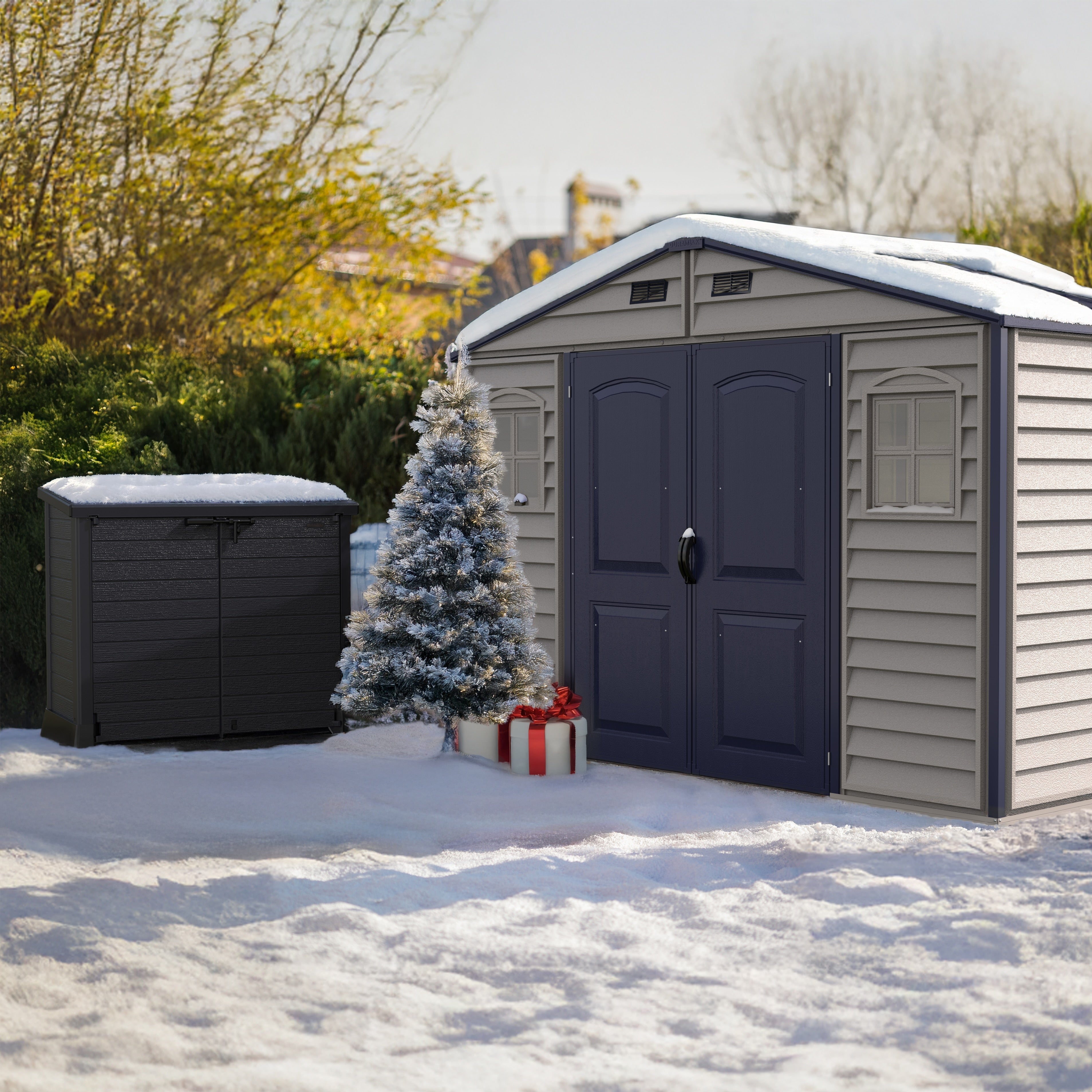 Duramax Storage sheds with snow on the ground, Christmas tree, and presents.