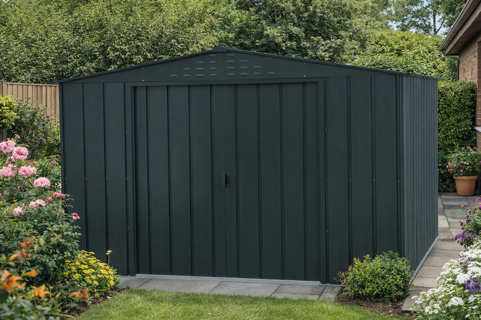 anthracite metal shed in a garden setting with flowers and a house in the background