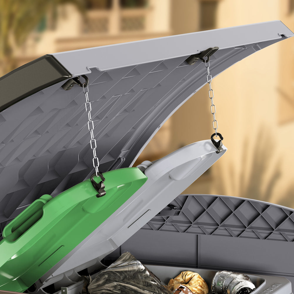 Grey plastic garbage shed with chains, holding bin openings.