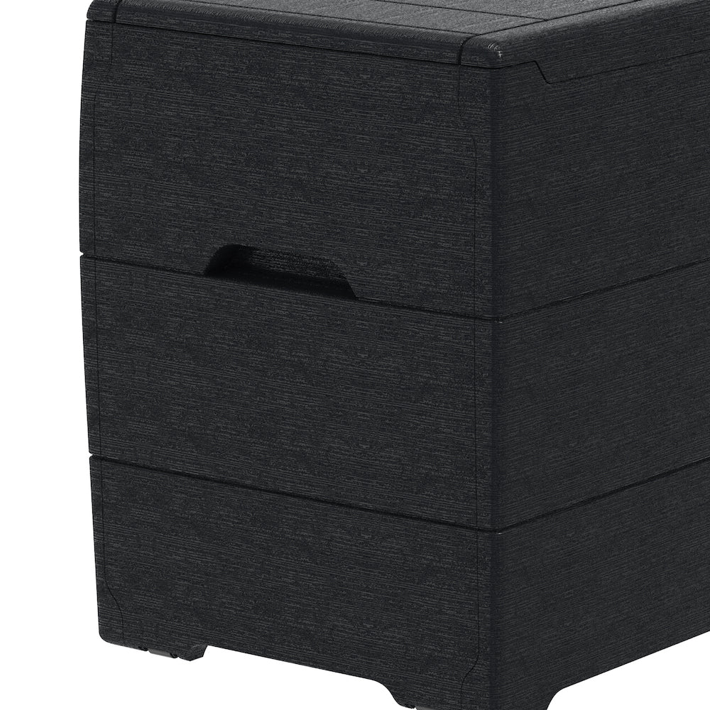 Grey cushion storage box with side handles for easy carrying.