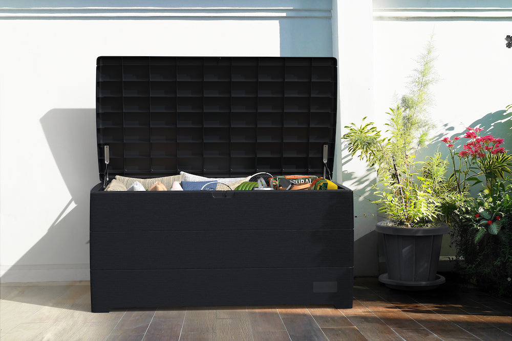 Plastic grey storage box for patio, can store many equipment or even act as a bench for the garden.