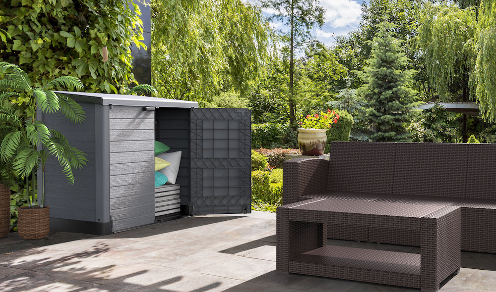 Grey plastic storage shed for patio, with two openings, can store any summer decorations.