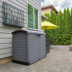 Grey plastic garden storage shed.