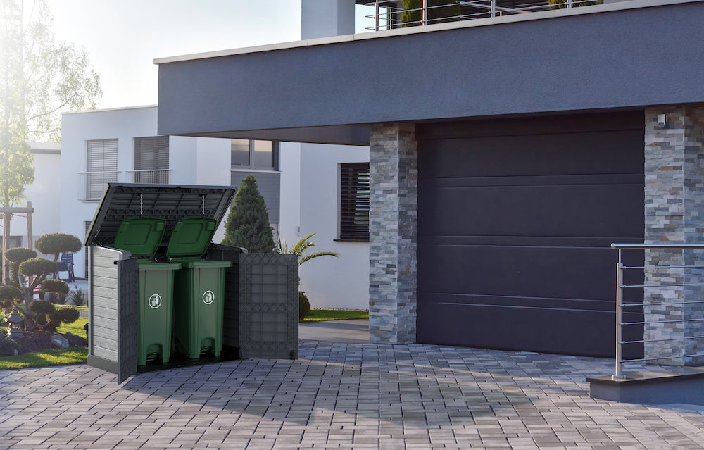 Grey plastic garbage container with two openings.